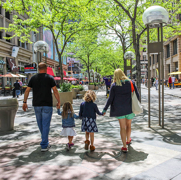 Family walking down a street